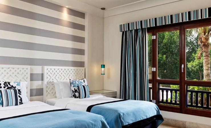 https://cms.satur.sk/data/imgs/tour_image/orig/juweira-boutique-hotel-hawana-salalah-oman-three-bedroom-apartment-blue-room-3-2111246.jpg
